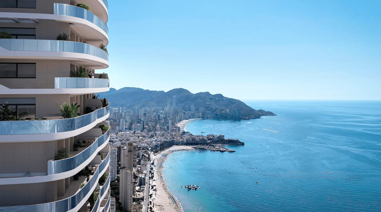 Luxury Spanish coastal property with ocean view in Calpe - modern high-rise building with glass balconies overlooking the Mediterranean Sea